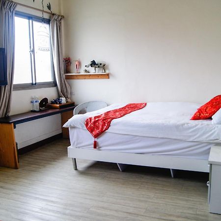 Ding Ding Homestay Цзиньху Номер фото