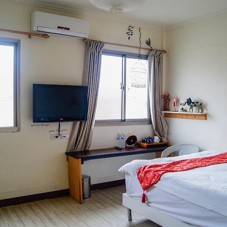 Ding Ding Homestay Цзиньху Номер фото
