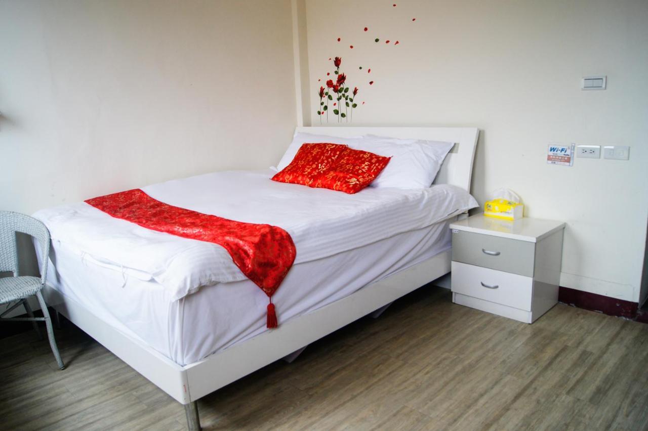 Ding Ding Homestay Цзиньху Номер фото