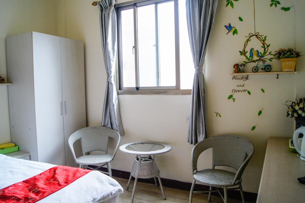 Ding Ding Homestay Цзиньху Номер фото